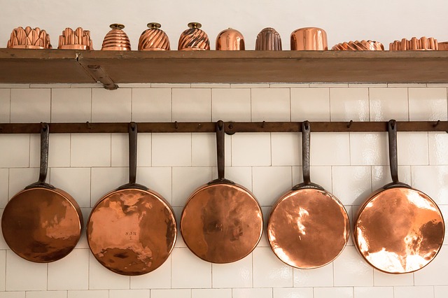 4 Easy Ways To Brighten Up Interiors - Copper Sauce Pans & Pots - Image By Stux