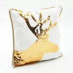 gold sequinned deer cushion