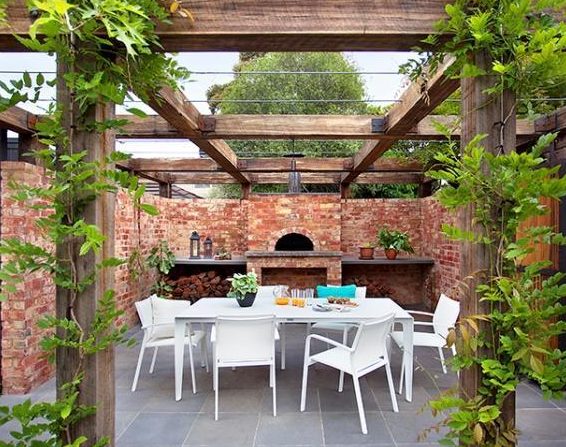 Summer Trends To Make Your Garden Stand Out - Vine Covered Pergola Entertaining Area With Pizza Oven Design Ian-Barker Gardens