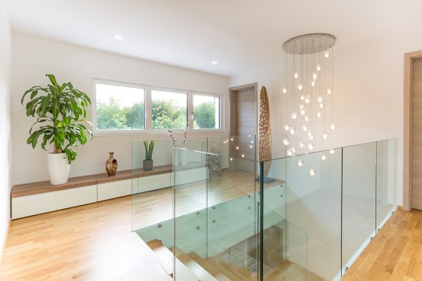 Modern glass banisters and modern lighting