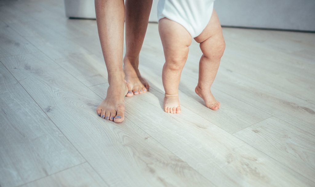 Mothers and Babies feet on floor