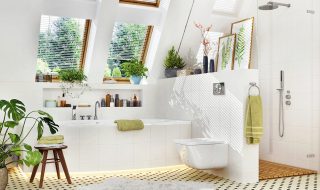 White luxury bathroom with bathtub and shower with plants and skylight