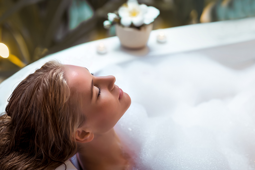 Women relaxing in bath