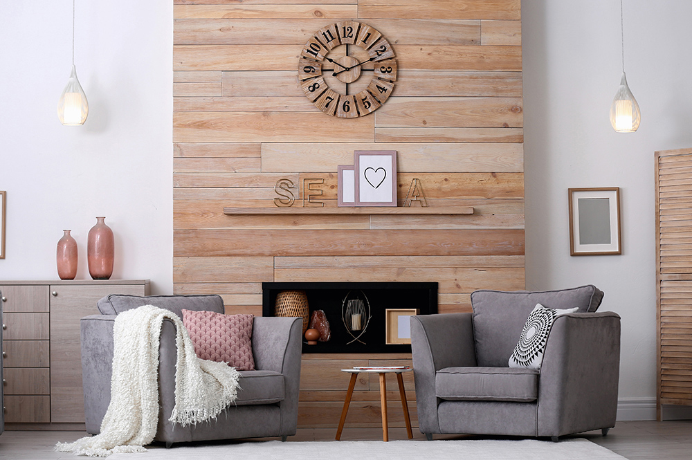 Grey chairs and wooden clock