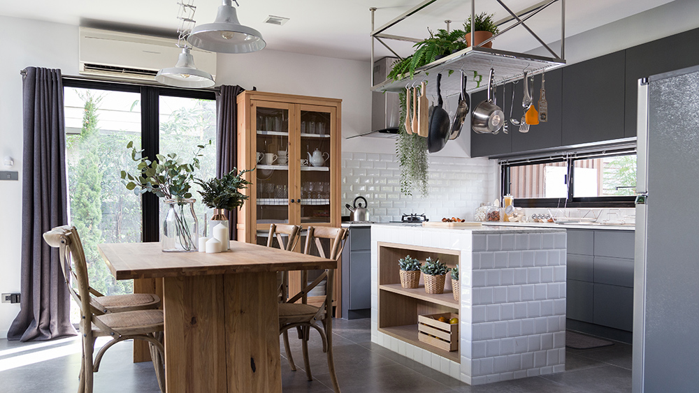 White and wooden kitchen with clever hanging storage area