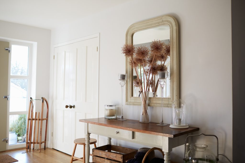 Bright open entrance hall. White and neutral tones