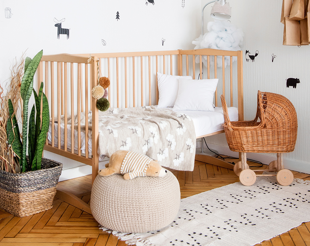 Childs bedroom with wooden cot