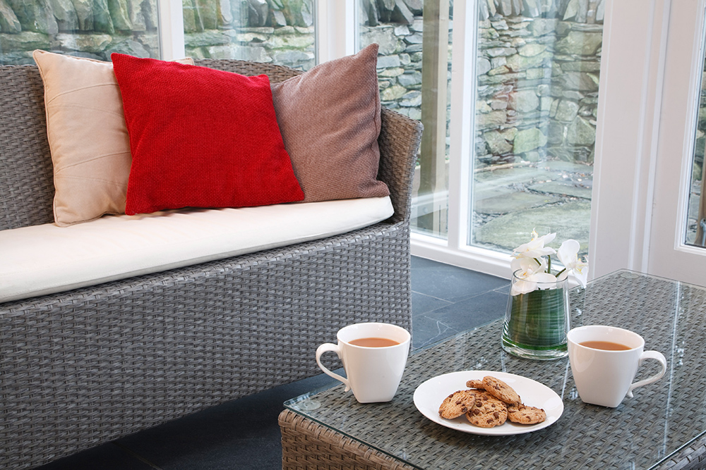 Wicker table and chairs set, in conservatory