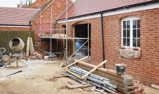 Red brick and red roof tile home extension