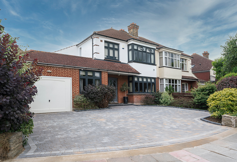 anthracite grey windows and block paving driveway